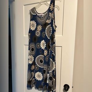 Sleeveless blue circle rayon trapeze style dress